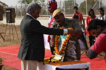 Director Prof. R. V. Rajakumar Garlanding the photo of Mahatma Gandhi
